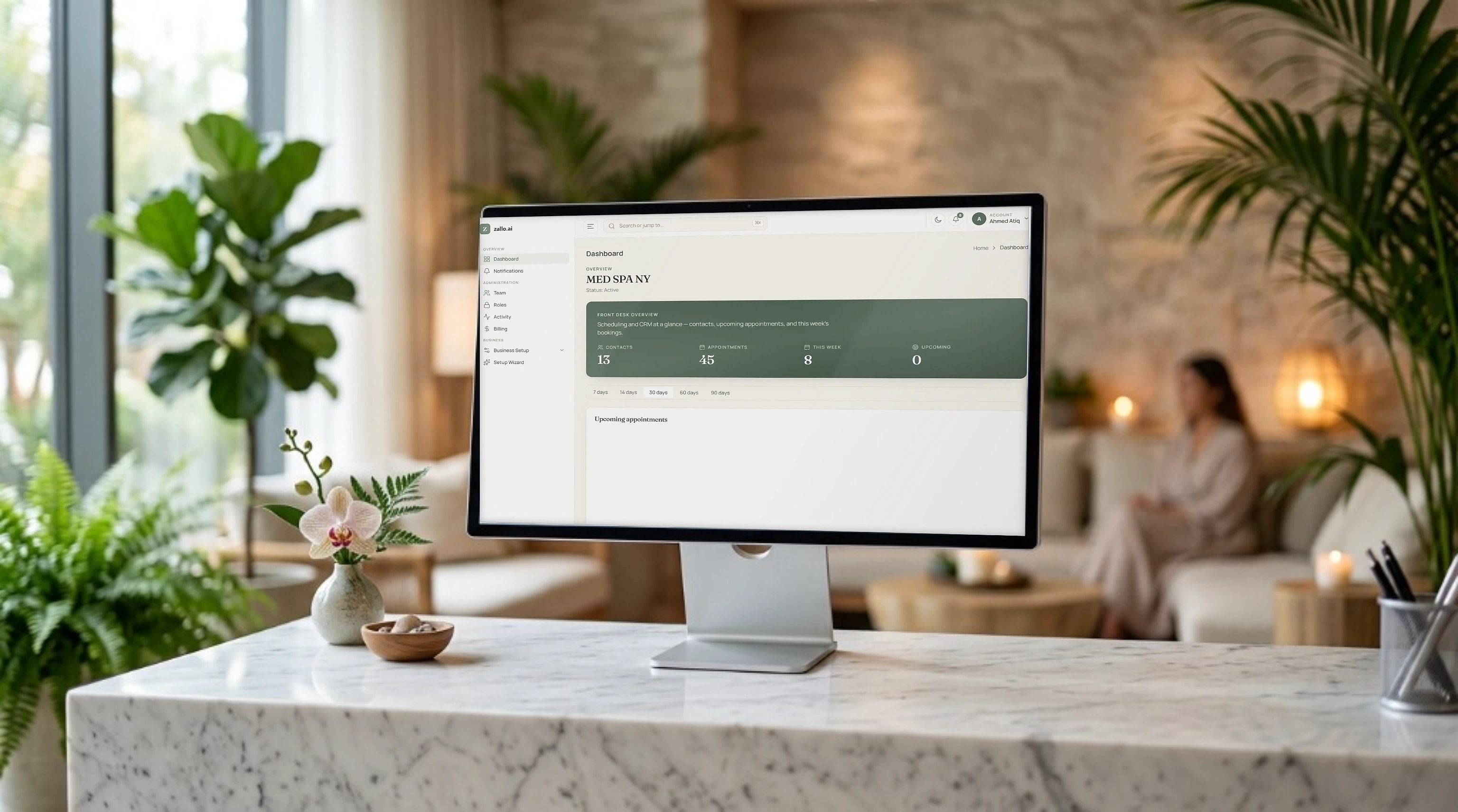 zallo.ai dashboard on a reception desk monitor